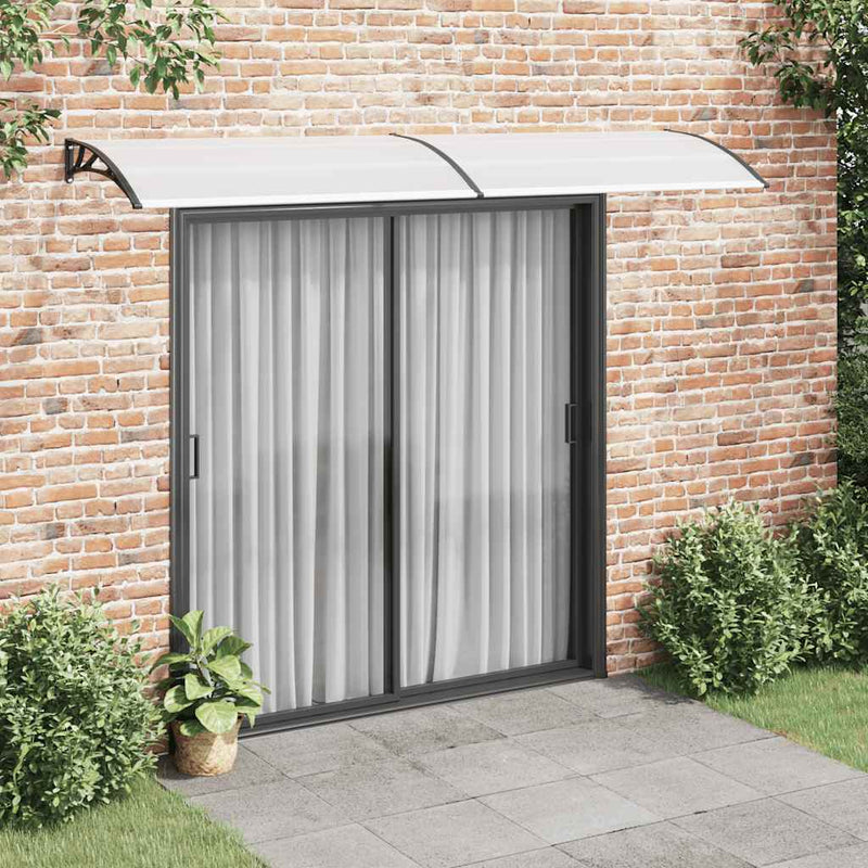 vidaXL Toldo para Puerta de Policarbonato 300x75 cm Negro y Transparente - Image 1 of 7